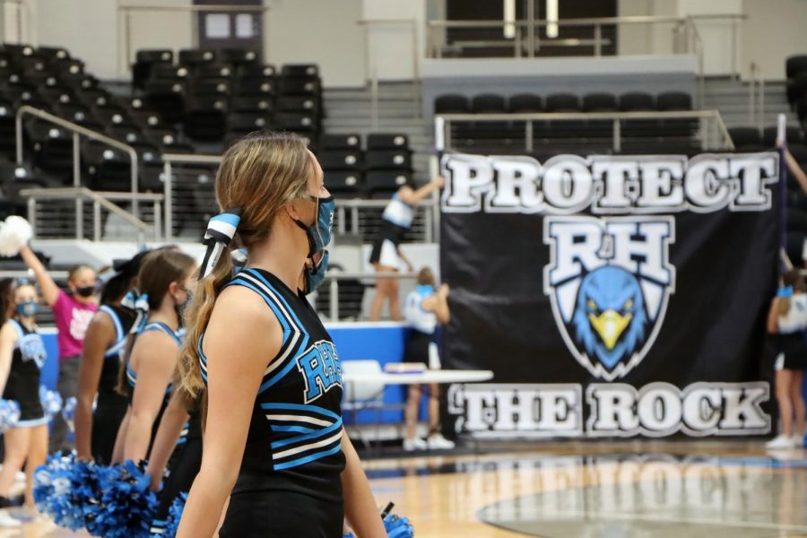 Cheer lines the arena before fall athletics make their way out on the court. Football played their first game at Frisco Heritage Thursday, Sept. 24. "Our preparation has gone all the way back to January," athletic coordinator and football coach Mark Humble said. "When COVID hit and we were on our extended spring break, we had virtual meetings and trained that way."