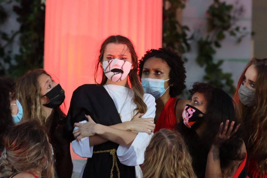 Senior and actress Hayden-Avery Miller stands surrounded by "savage chorus" members at the Medea dress rehearsal. Theatre will perform the first performance of the show tonight at 6:30 p.m. Due to COVID-19 concerns, students will perform the show outside with face coverings. Tickets are $5 each.