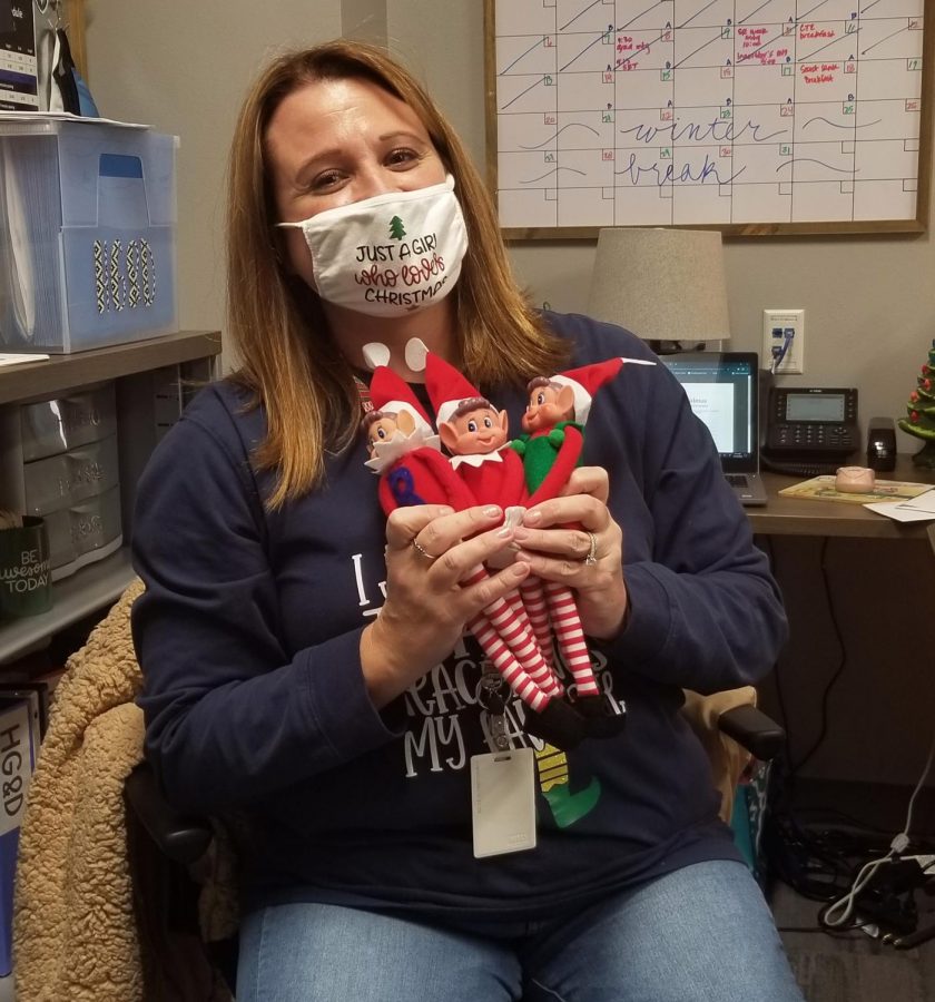 Student council advisor Shallon Slade holds toy elfs Maximus, Merrick, and Molly. Student council will be hiding them throughout the school. "It was actually an idea from our student leadership team,"  Teacher Shannon Slade said," like a hide and seek, they're hidden throughout the school in the morning."