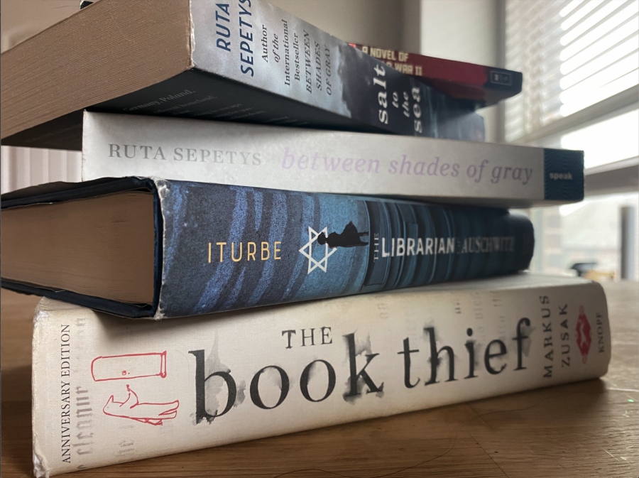 A collection of historical fiction books sits on a desk. Columnist Gianna Ortner-Findlay reviews these books in the following article. "As a person whose Jewish great-grandparents on my father's side fled from Germany to escape the Holocaust, I have always had an intrigue with World War II and the Holocaust," she said. "These are just a few books that I would like to suggest to help remember the strong individuals who made it through the awful war and to hear the stories of those who didn't."