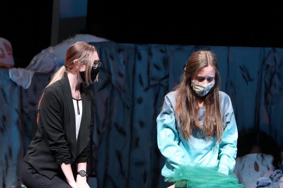 Senior Hayden Miller (Dr. Todd) comforts freshman Sasha Sims (Mary Blanton) in a scene of "Cry of the Peacock." The UIL One Act Play Company advanced through Zone and placed as an "Alternate School" at district. The team also took home several individual awards, including Best Technician, All Star Cast and Best Tech Crew. 