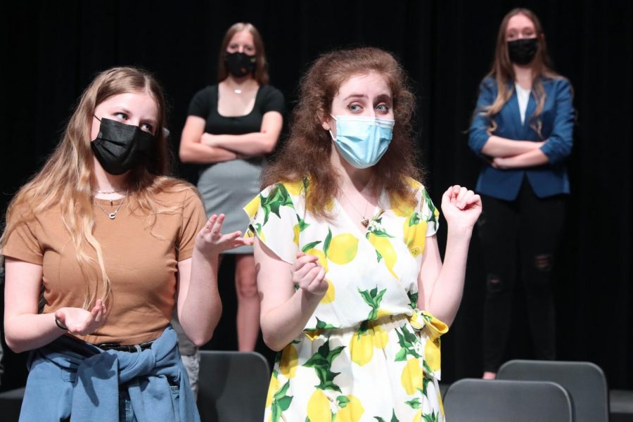 Senior Nikki Hansen and sophomore Lainey Cosgrove act out an ending scene of the musical theatre class's original musical. The cast of "Who Done Did It? A Juicebox Murder Mystery Extravaganza: The Musical" presented three performances of the original piece. "As we started to practice this musical, it became clear that nothing about it was concrete," senior and student director Evan Warren said. "Every aspect of the show could, and would, be changed completely at any given moment. We were practicing a show that was still being created. We were in a show that was still alive. And that was an amazing experience."