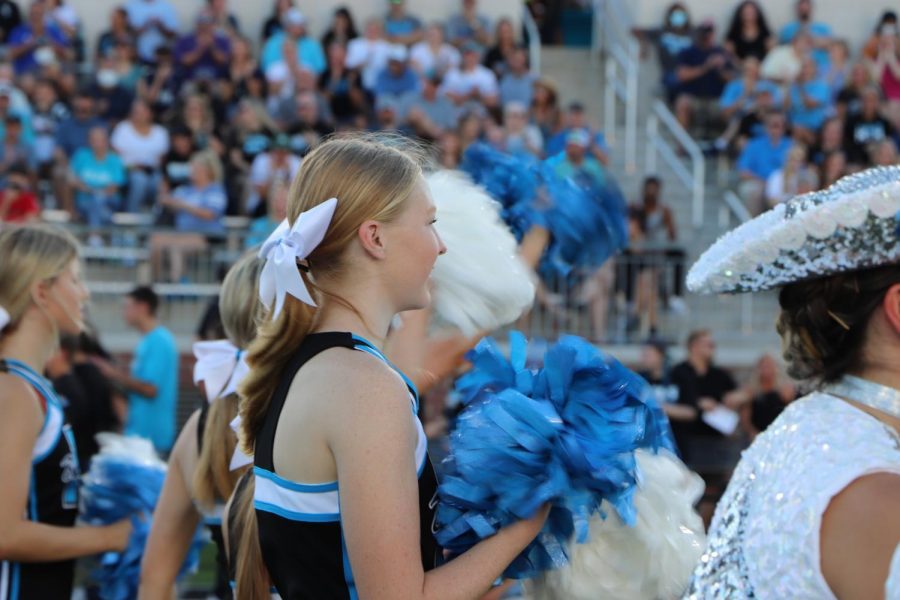 Rock Hill Cheerleaders cheer on for the football team.