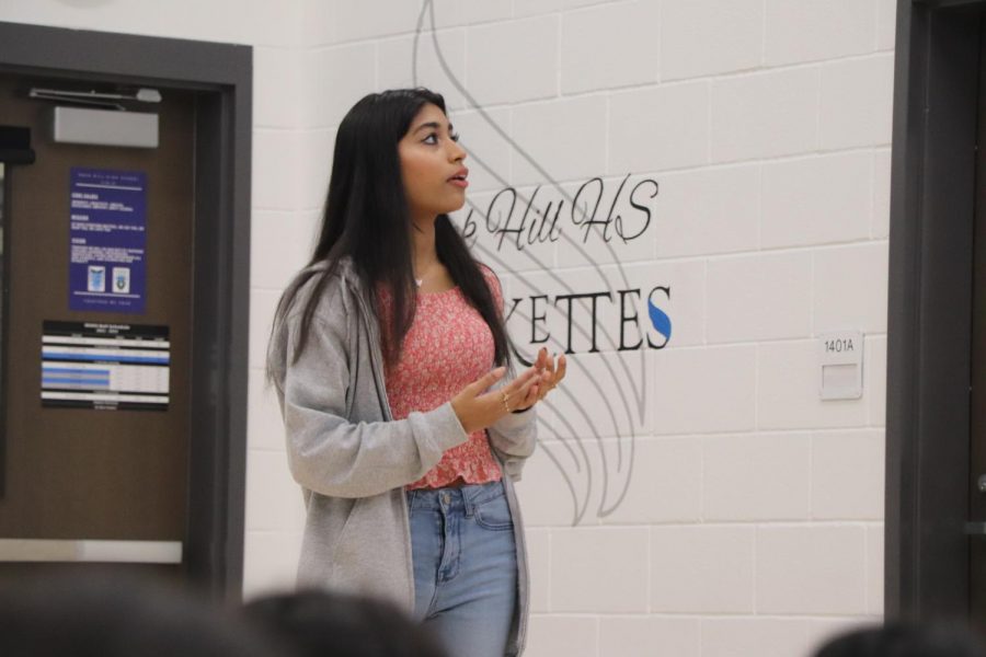 Captain, Khushi Sharma, presents information at initial dance meet