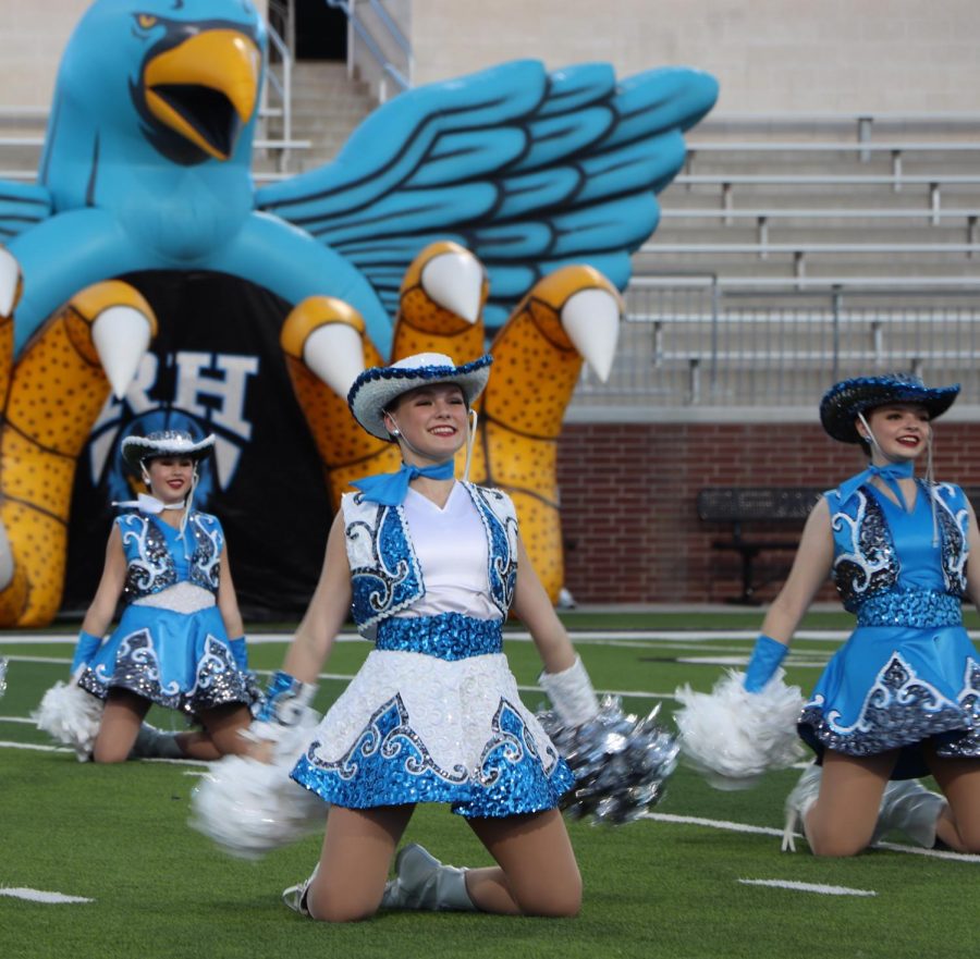 The Rockettes dancing one of their many dances from Meet The Blue Hawks. Kiera Parks, Sophomore Lieutenant, said "I look forward to all the games and the pep-rallies and the community events."