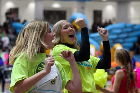 Seniors Olivia Clark and Reagan Lambert cheer on the senior student section at the final pep rally of the year. "The pep rally was an enjoyable experience that brought the school together one last time this year," said junior Akshita Joshi. The senior section won the spirit stick one last time.