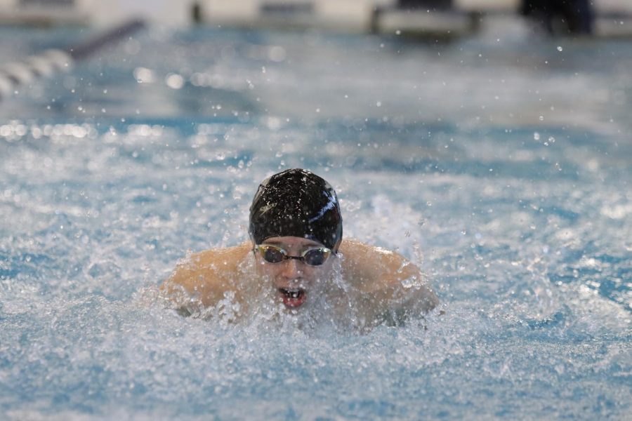 Sophomore Shawn Reid swims the 200 freestyle event. He took first with a time of 2:03.33, a personal best. Despite his results, Reid pushed himself farther and took a few practice laps. I [did] okay but I could have definitely gone faster. I know I can give that one extra pull, that one extra kick underwater, and [it would]   affect [my time] in the smallest way, Reid said.