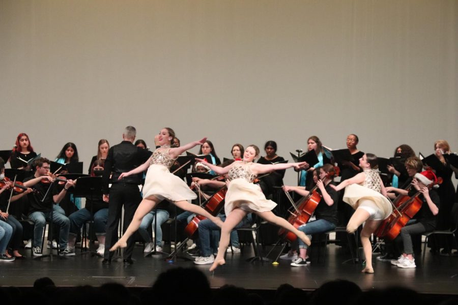 The show started off with a bang with orchestra, choir and Rockettes coming together for the performance. The Rockettes came out dancing to, Amid the Winters Snow by John Goss. Rockette Faith Cardell said, It was a great experience collaborating with other fine arts groups and being able to showcase our talents all together [and] we are so lucky to have such great opportunities here at Rock Hill.