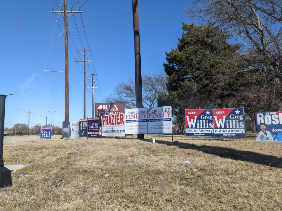 At the intersection of PGA and Preston road, many politicians have put up their campaign posters. Shown below are the posters of ______. 
"If you drive out on these major roads, we can see these big and bright posters trying to grab the attention of the drivers and passengers for a vote or two" Yasmin said. 