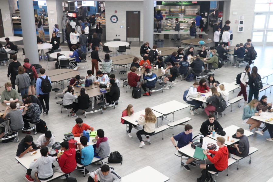 Students sit in the Rock Hill High School cafeteria during lunch. "Aramark designs and creates all of the food options available, except for Pizza Hut and Sonic at Rock Hill and Pizza Hut and Burger King at Prosper HS," Deputy Superintendent of Prosper ISD, Dr.Greg Bradley said. "These fast food chains sought the opportunity to be included in our high school offerings." 