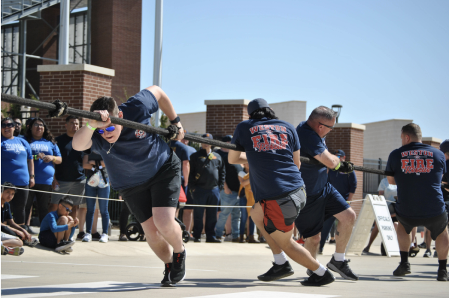 Nearby firehouse, Weston Fire, participated in the fire truck pull with several members of their on-call company. "I am a Transition Teacher," Barrios said, "meaning that I work with students aged 18-22 years old that have completed their high school credits, but they still have some areas of growth to work on." The pull teams were made up of ten people, and the fee to pull was 10 dollars a person, or 100 dollars per team. 