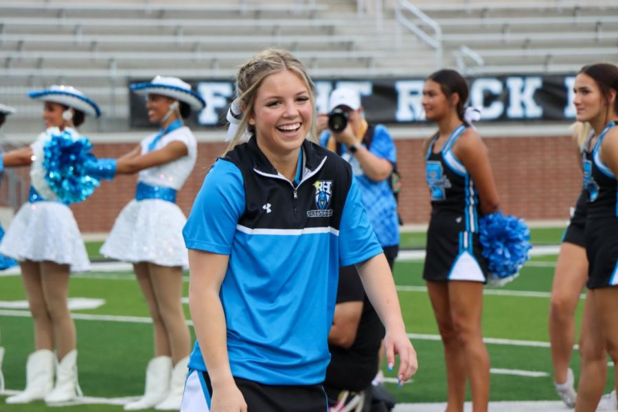 Senior Kati England, a varsity athletic trainer, takes the field. "I hope that our [sports medicine] team grows stronger this year and that we do the best that we possibly can to help all of the sports," England said. England is also the co-captain for the varsity cheer squad and looks forward to attending all of the football games during her last year being a part of sports medicine and cheer.