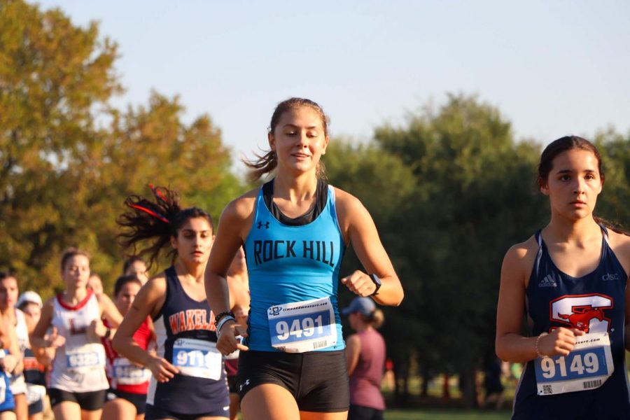 Senior Sadie King runs in the MileSplit invitational. This is her first year on the team, as she was previously on the JV girls soccer team. 
