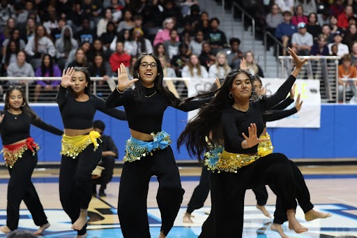 As the Bollywood team entered the floor, the aren became very loud as  the student body cheered them on. Their performance featured a combination of traditional  Indian and pop dance styles. 