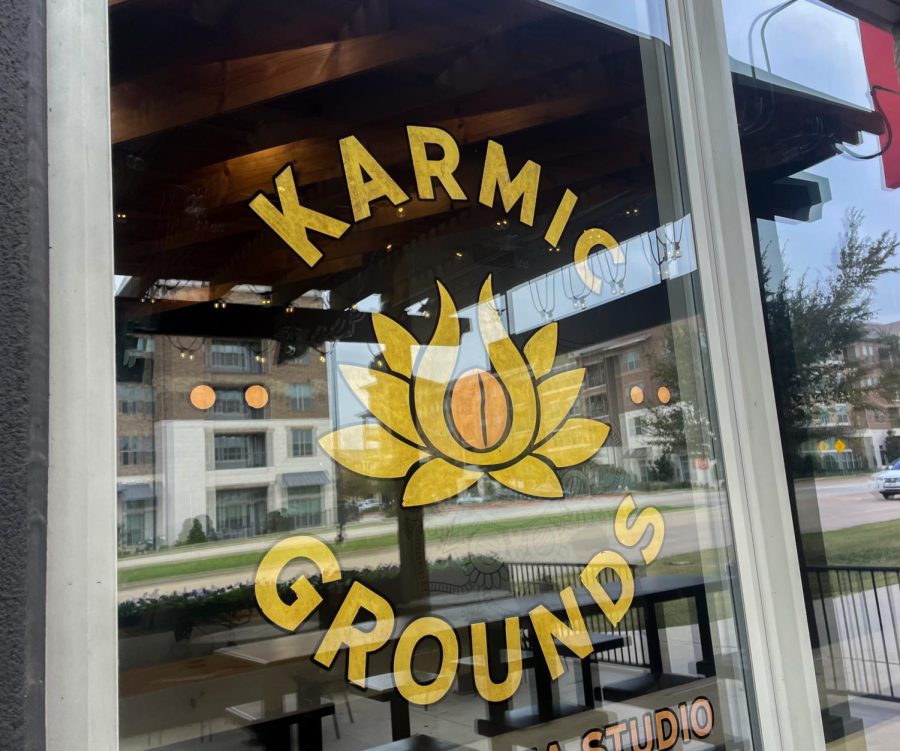 Featured is the logo of local coffee shop Karmic Grounds located on Ohio Drive Suite.