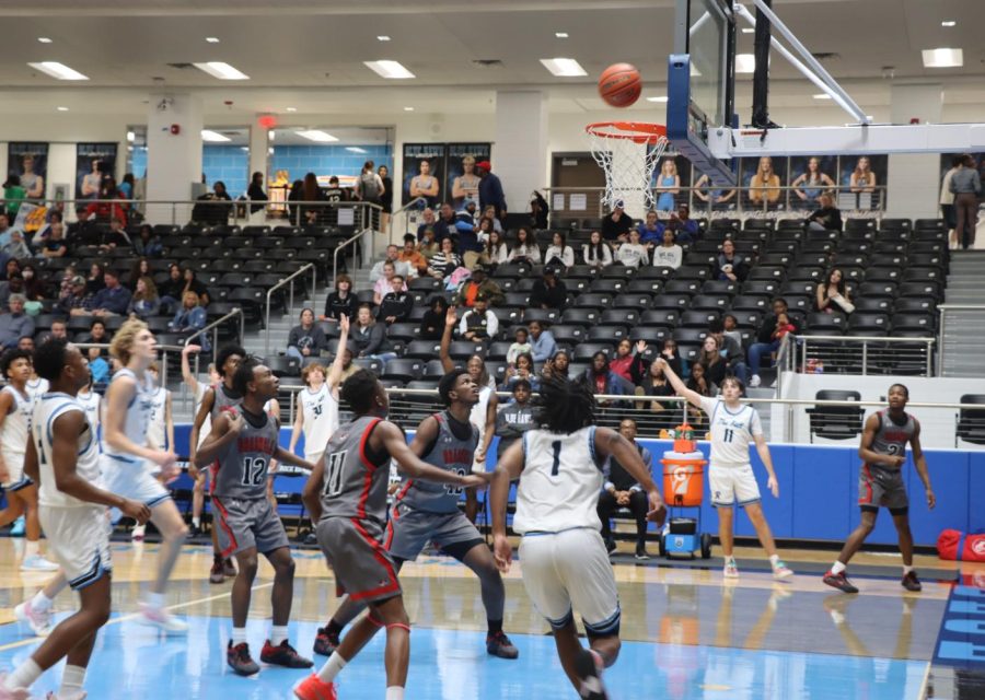 The basketball was thrown by Riley Shore; caught in mid-air. The Rock Hill Blue Hawks are currently third in district, and have a one week winning streak. 