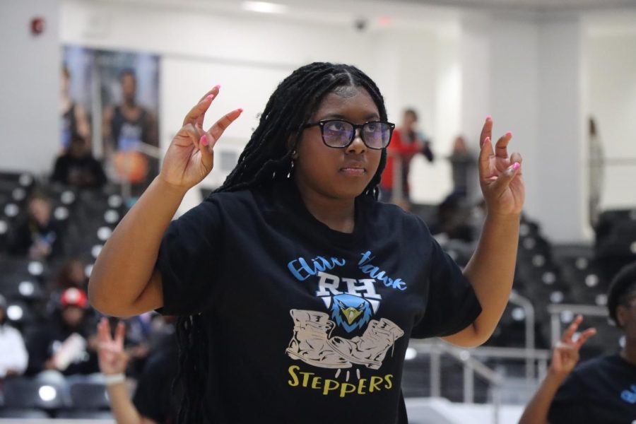 Holding up the Rock Hill Talons to end their dance, junior Kyla Anderson looks fiercely into the eyes of Rock Hill's competition. "My ultimate goal is to see each person become more confident in who they are," Anderson said. "I am a firm believer that being apart of this team opened some of the most shy people including myself." Anderson wants to help inspire others to step out of their comfort zone. 