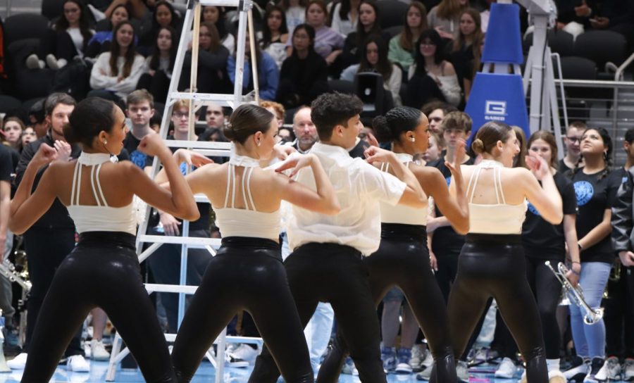 The Rockettes officers perform a dance routine during the pep rally.