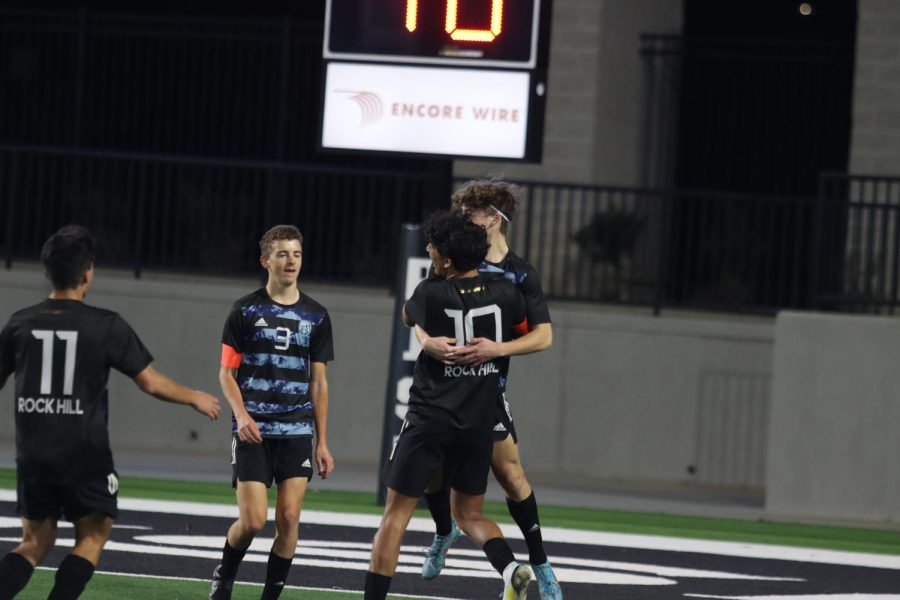 Seniors Caleb Zavala and Mateo Cabrera celebrate after Cabrera scores a goal. "It felt really good," Cabrera said, "especially [my last] goal; I remember it kind of sealed the deal, since we were losing 3-2, and the score after it was 3-3." Rock Hill eventually lost in the penalty shootout. 