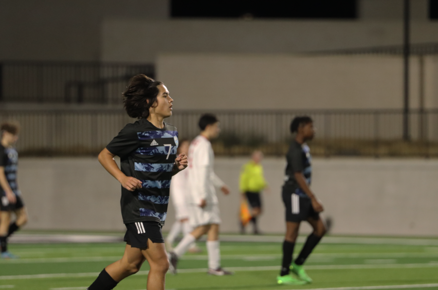 Sophomore defender Devon Garza runs across the field as the game progresses. "We played well, just that the end didn't come out as we thought it would," Garza said. "We should have won."