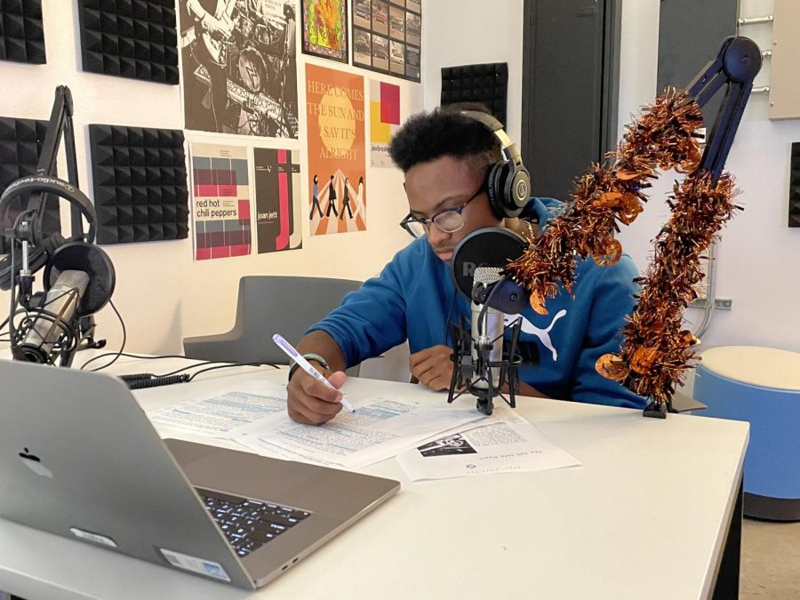 Senior Aiden Brackens edits part of a script for his Spooky Stories assignment in Rock Hill Radio / Digital Audio Technologies class. 