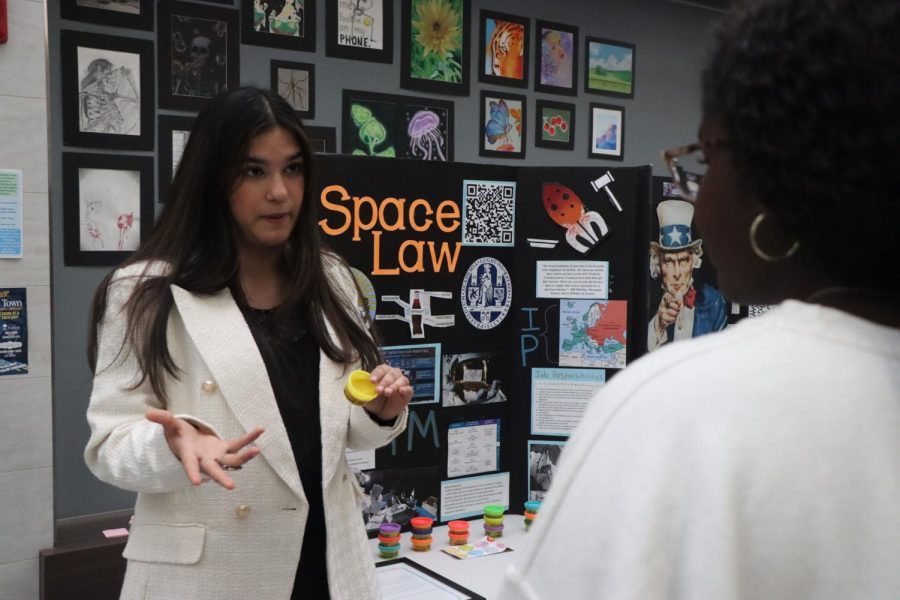 Senior Shreya Srivathsan demonstrates the career of her choice: space law. “So my research was over intellectual property in outer space law,” Srivathsan said. “I was sharing my experience as a second year PCIS student while showcasing my passion for these fields.” 