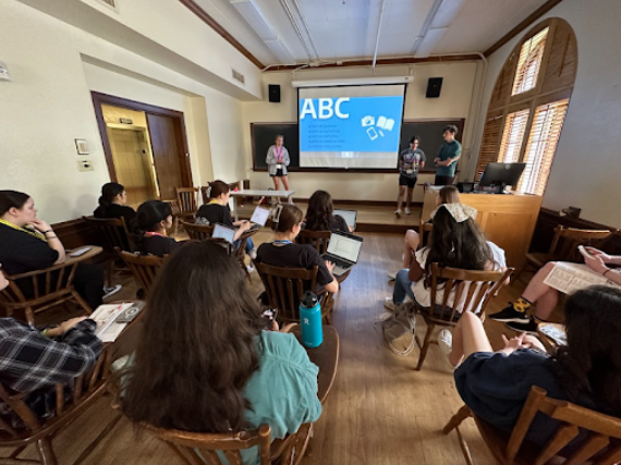 Hill Top News seniors Kyla Lewis, Brandon McVay and Connor Fuxa present a class titled "Newsroom Inside Edition," in which they share the ins and outs of HTN. “I thought it was really great for me to get some leadership experience,” Fuxa said. (Taylor Mersmann)