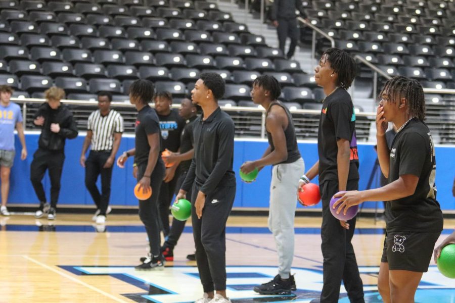 Team Triple O waits to throw the balls at team Ballers. Students witnessed a stalemate as no one was attacking. “The game was interesting to say the least,” sophomore Audrey Hanks said, “but was fun to watch after class.”