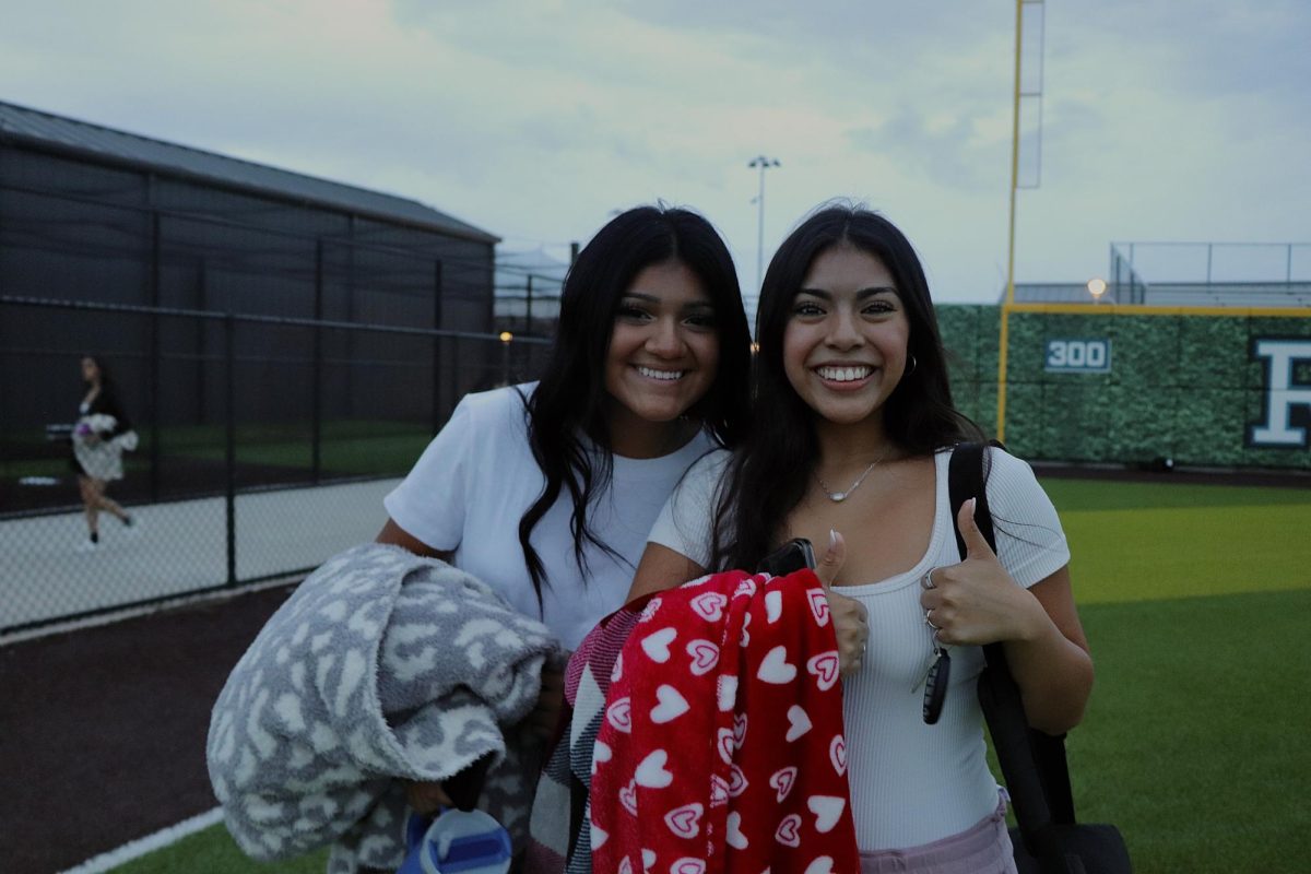  Arriving at Rock Hill, seniors Allison Gonzales and Shelvy Cuenca make their way on the field to watch the sunrise. “It is a really good tradition that Rock Hill has,” Cuenca said. “I am really excited for senior week, and letting us actually win the spirit stick this year for pep-rallies.” The spirit stick is awarded to the most spirited class at each pep rally, and there’s speculation that the administrators favor the graduating class in the last pep rally of the year. They prepare to make even more of the many memories they will have as seniors. 