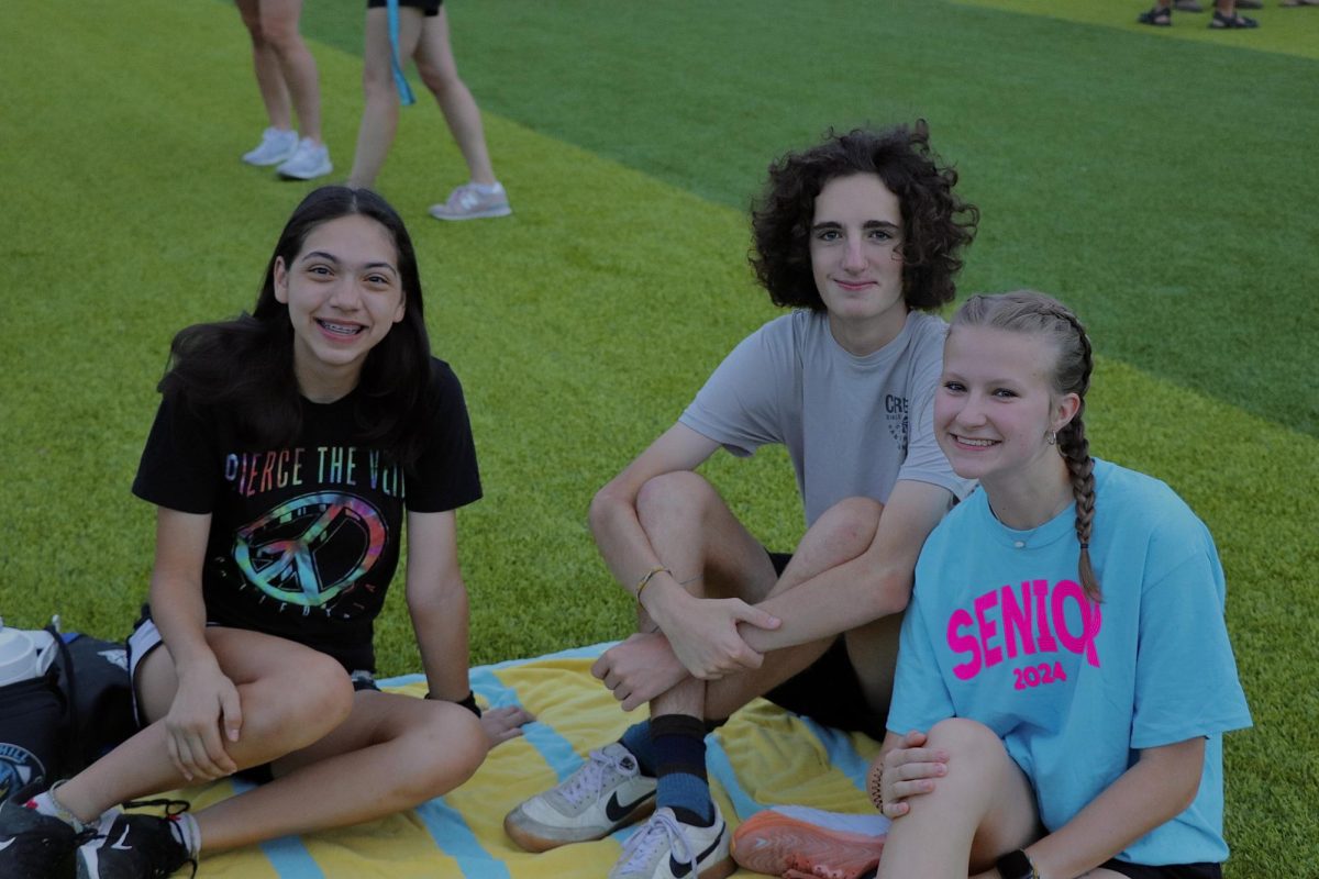 While preparing for the sunrise to start, seniors Nayeli Palomeque, Wes Phipps, and Reagyn Harrington discuss their memories and future aspirations for their senior year. “Senior sunrise was a great way for all of the seniors to start senior year, and get to see friends and classmates we hadn’t seen over summer break,” Wes Phipps said. “It’s an awesome tradition to keep going, especially because it’s something each grade looks forward to.” Phipps is excited to graduate with the rest of the class.