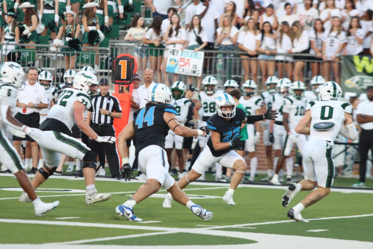 The first down of the game captures all the small accomplishments made by players from both teams. "I feel like a lot of people were doubting us, but we proved them wrong," senior varsity football player Zeke Akin said. "I'm very excited to start again and to keep playing football like always." Akin holds many goals and aspirations for future games. 