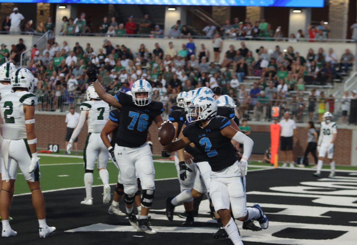 After catching a touchdown made by Rock Hill, the players celebrated this little moment. "My advice to those who want to play in high school is to have fun," senior varsity football player Benjamin Rosa said. "To embrace everyday no matter how difficult that may be because it really does fly by and is over before you know it." The crowd also cheered for this small win. 