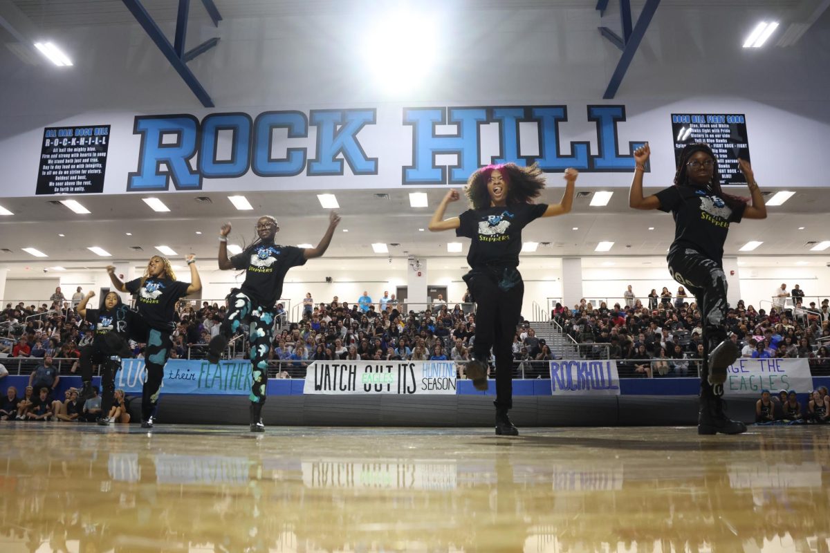 The Blue Hawk Steppers performed in the middle of the pep rally to excite the crowd for the football game starting at 7:00 p.m. against Prosper High School.  