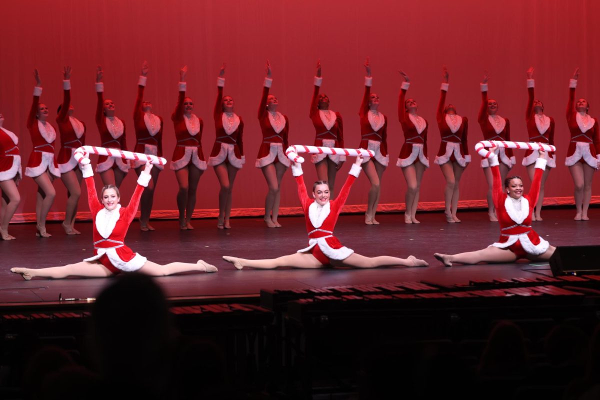 Wrapping up the event, the Rockettes danced away with their candy canes in hand. “My favorite part was dancing with my team and jump splitting with my officer line,” junior lieutenant Sydney Ayres said. “I think we inspired a lot of eighth graders to try out next year.” A standing ovation was given by the audience to these dancers at the end of their showing. 