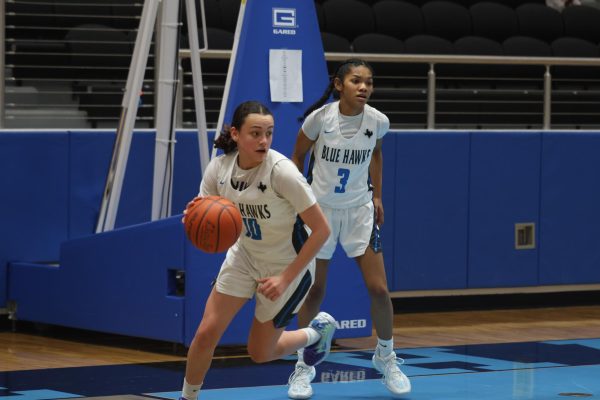 Freshman Sofia Read prepares to pass the ball to one of her teammates. "I'm the point guard, the point guard job is to facilitate everybody else on the court," Read said. She currently has one college offer to the University of the Incarnate Word (UIW). 