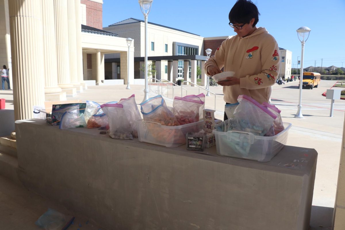 As a student collected chalk for the team's art mural, these were among the resources available for students to utilize in their creative drawings. "It's a really fun event, it was nice having more teams, and hopefully every year it continues to grow and we have more and more clubs and sports and more representation here," art teacher Crimson Scott said. "We did run out of black chalk this year so that was a little bit stressful, but it was good." All of the art murals can be seen at the front of the school. 