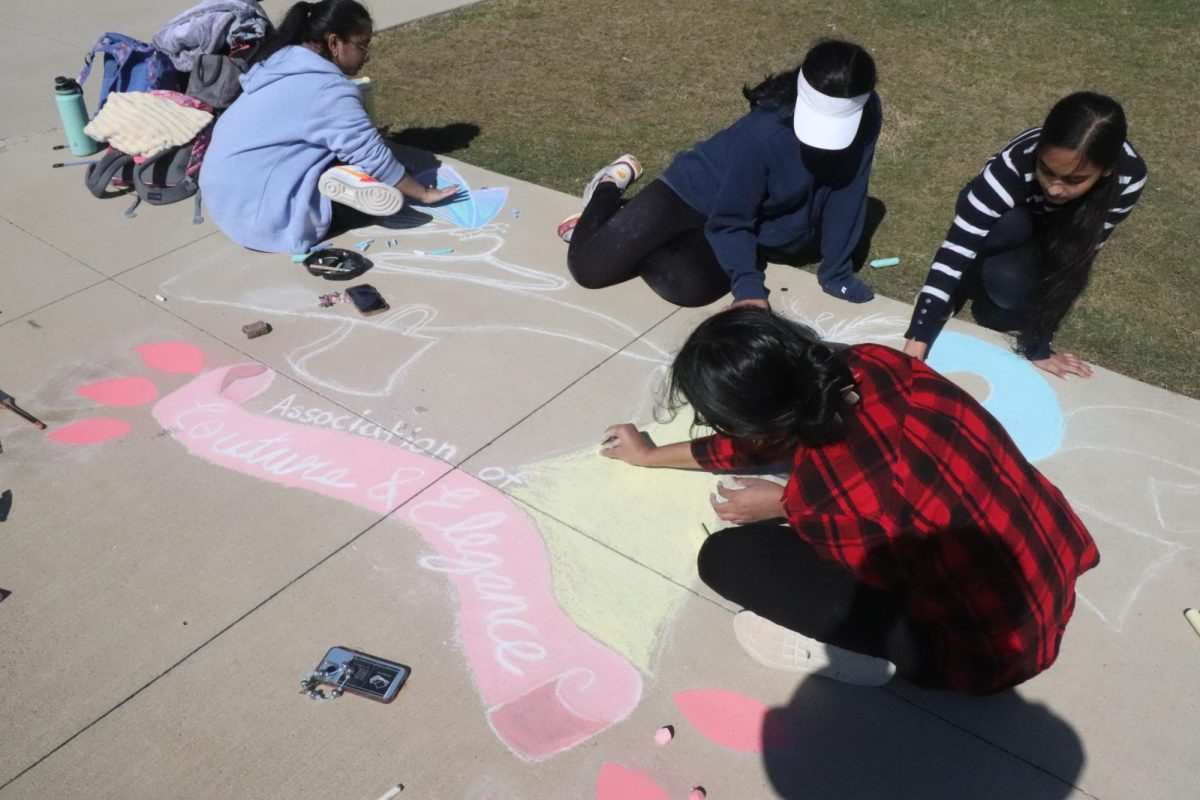 Adding lots of pastel colors to their artwork, the students represent the Association of Couture and Elegance (ACE). 