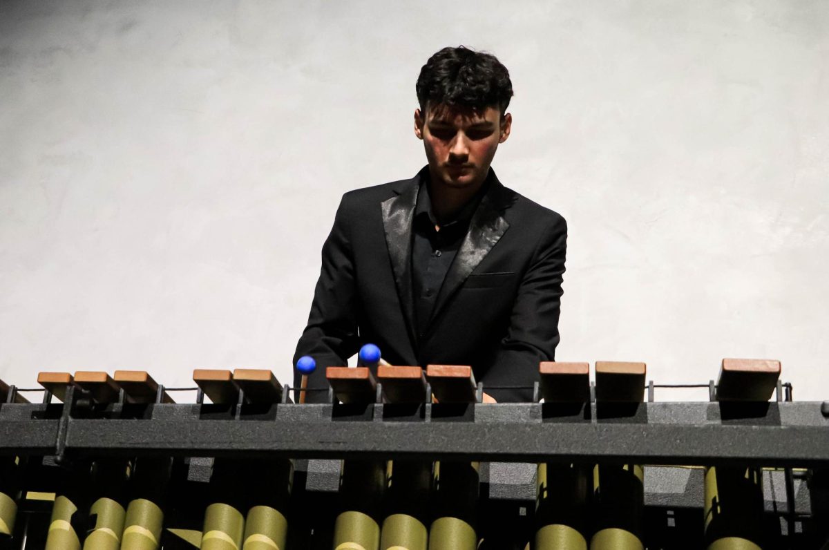 Senior Luca Colaruotolo is a featured Marimba soloist in ‘White Knuckle Stroll,’ created by Casey Cangelosi. Colaruotolo was named an outstanding soloist during the RHHS Band Cluster Solo and Ensemble contest. 