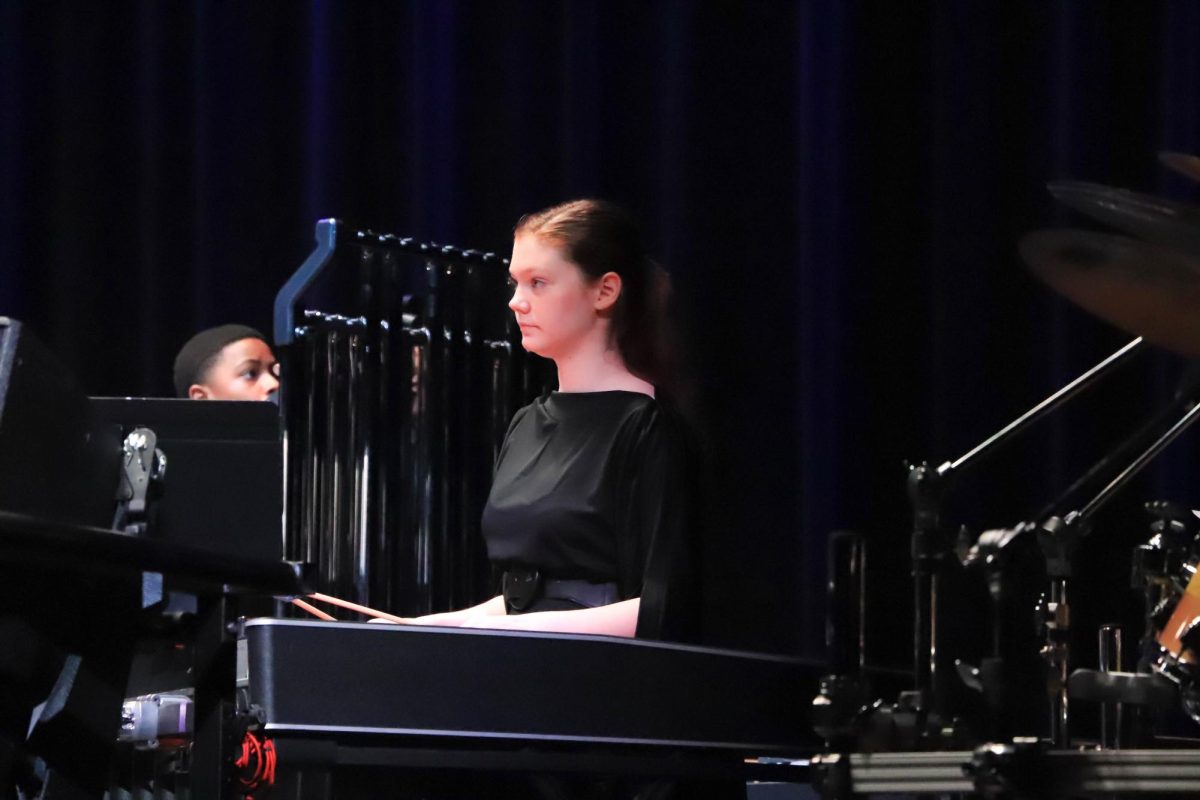 Freshman Evelyn Chatham performs on the ‘name of percussion instrument’ as a member of the Rock Hill Symphonic Band Percussion ensemble. The RHHS Symphonic Band Percussion ensemble performed ‘Little Miss Ugly Face,’ created by Ravel. 