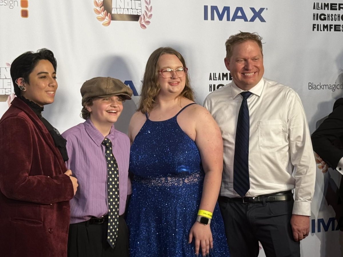 Jenica Morales-Spruill,  Paige Olsean, Abby Alfred. and Russ Oslen getting to go on the red carpet for the All American Film Festival.  