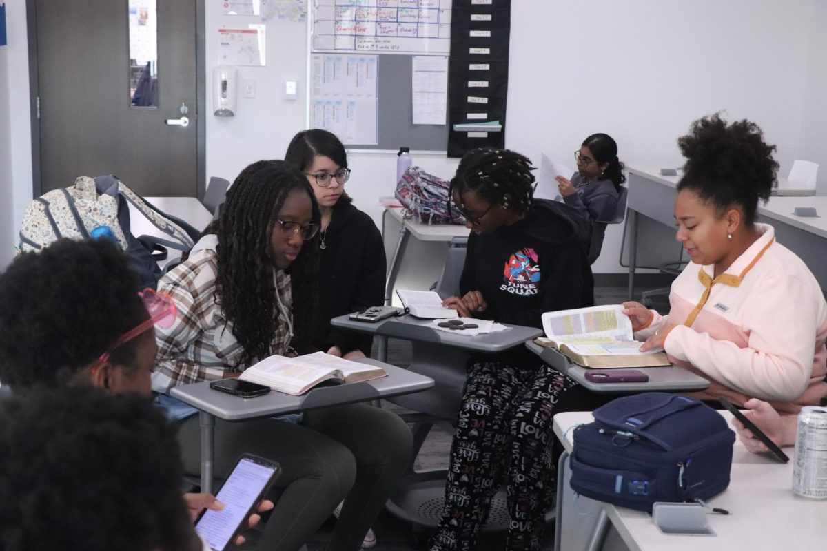 Rock Hill students sit in a circle discussing morality, "It is just a way for all of us to learn about the Bible and discuss our thoughts." Victoire Mande says. 