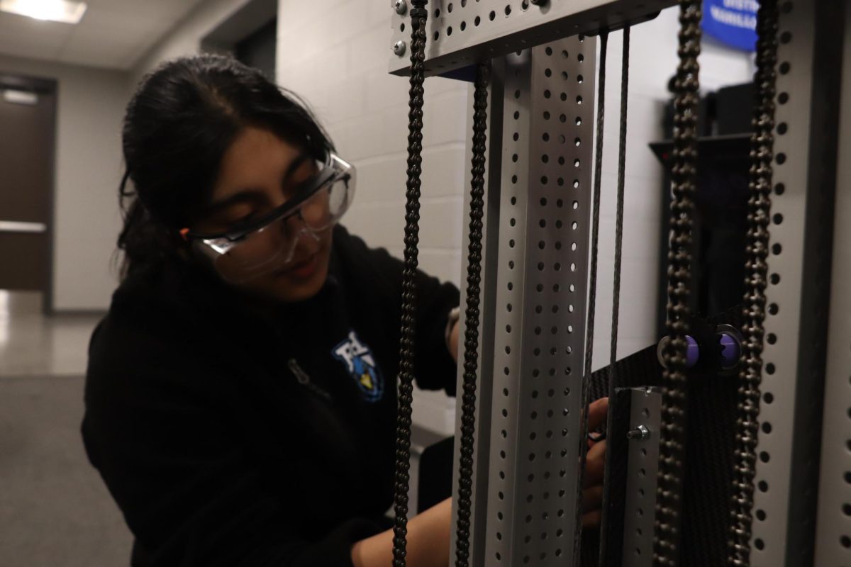 Sherlyn Mathur works on a structure during robotics practice. “I'm part of the Prosper Engineering Team, specifically on 9492 Lady Talons,” Mathur said. 