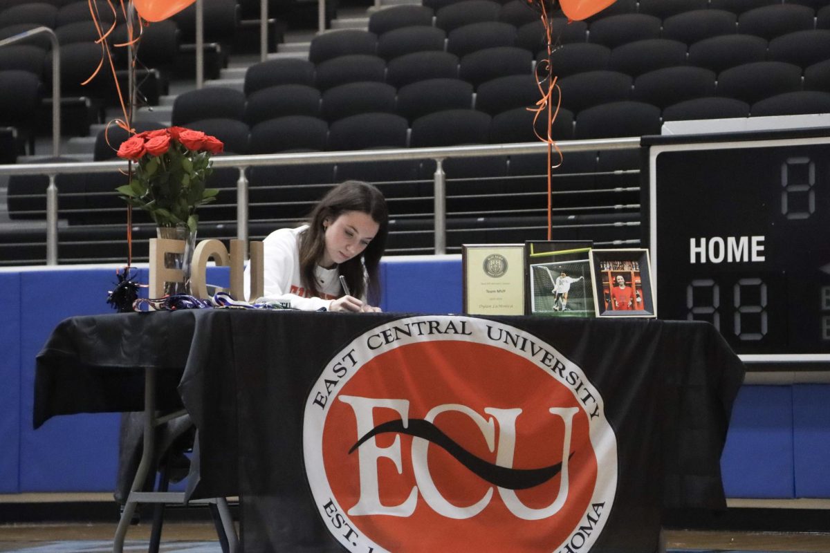 Senior Dylan LaMonica signs her National Letter of Intent for East Central University. “My coaches for sure helped me get here, and my parents as well throughout this whole process,” LaMonica said. “They were always willing to drive me everywhere and have always supported me.”