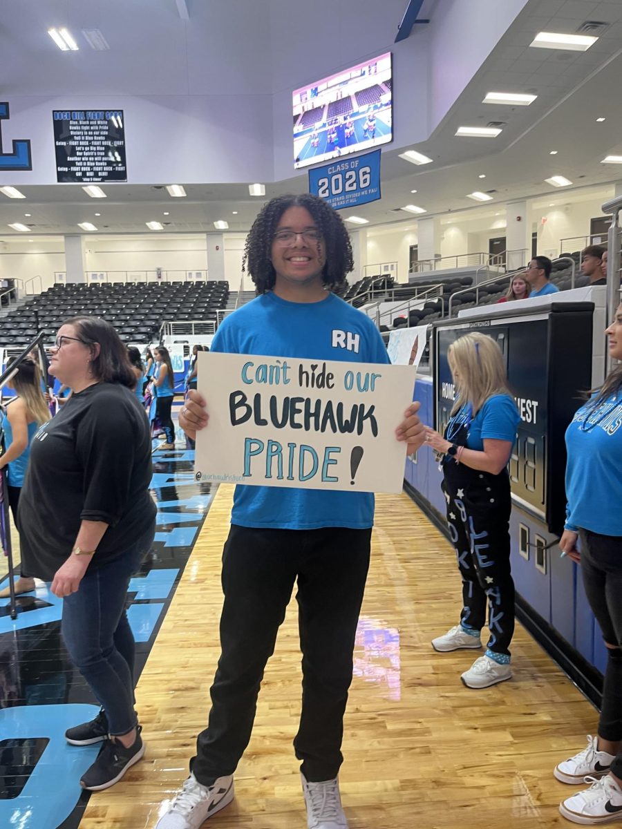 Barnes holds up a poster promoting school pride at a pep rally. “[In Student Council], last year I was an executive officer and then this year I'm vice president,” Barnes said. “It’s taught me how to be a leader in the world.”