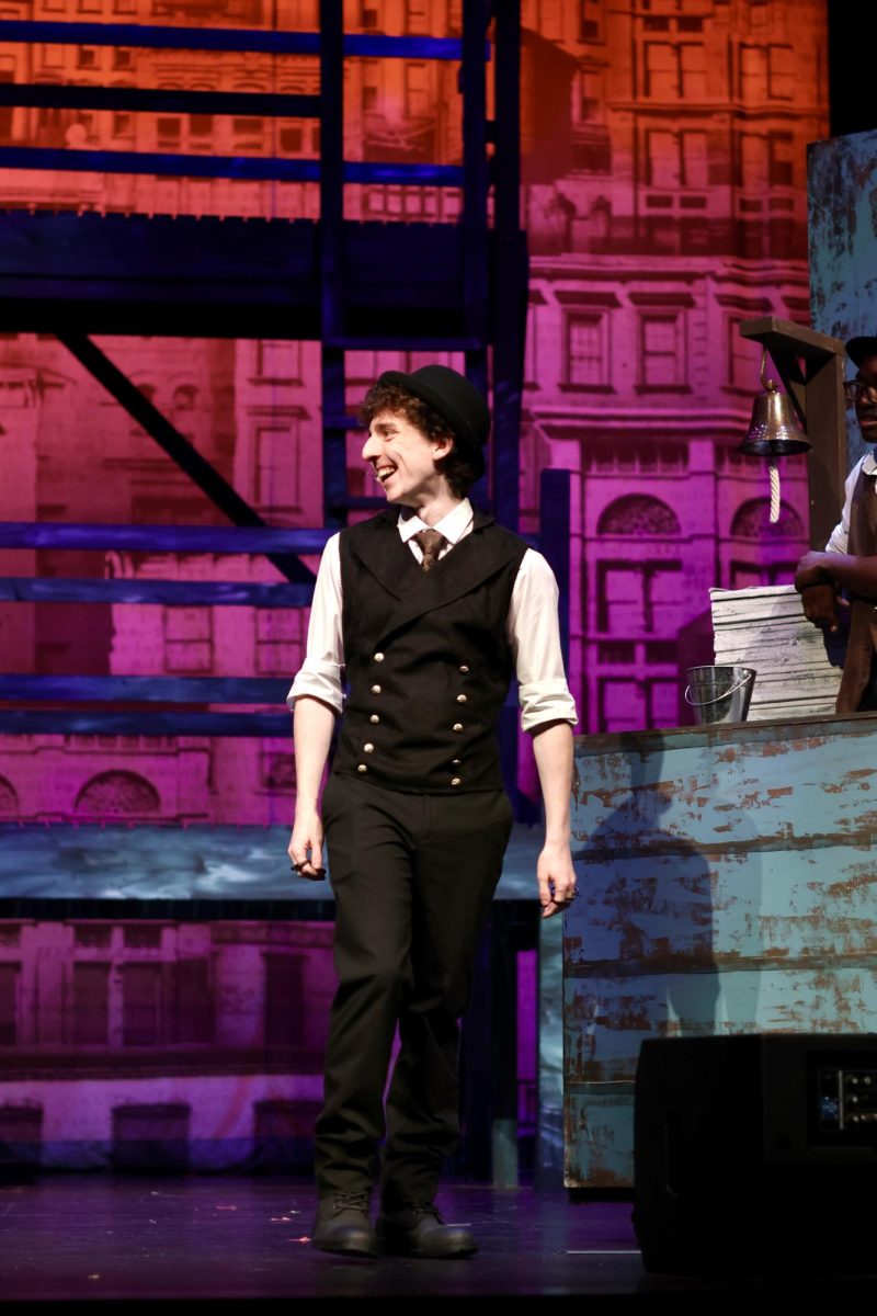 Chance Johnson as Morris Delancey in Newsies.