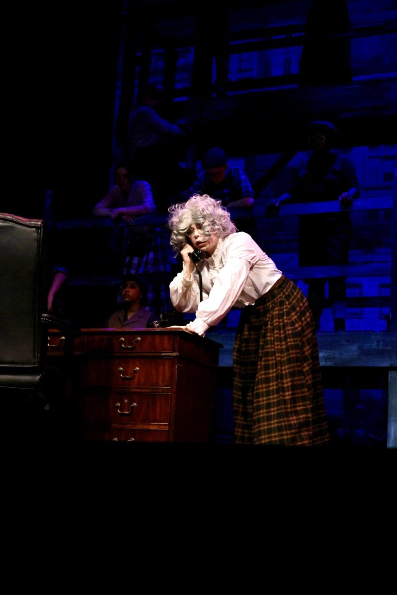 Mack Flowers as Hannah in Newsies, Mr. Pulitzer's assistant. 