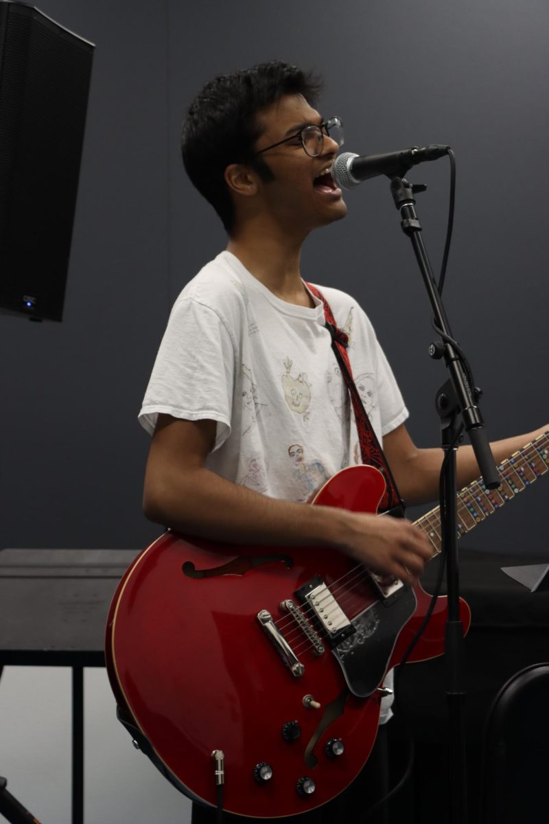 Senior Kareef Khan practicing vocals.